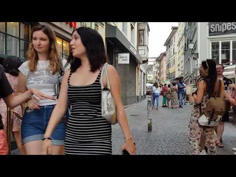 Niederdorf, famous small street in Zurich Switzerland / Bellevue Zurich / Catholic Church
